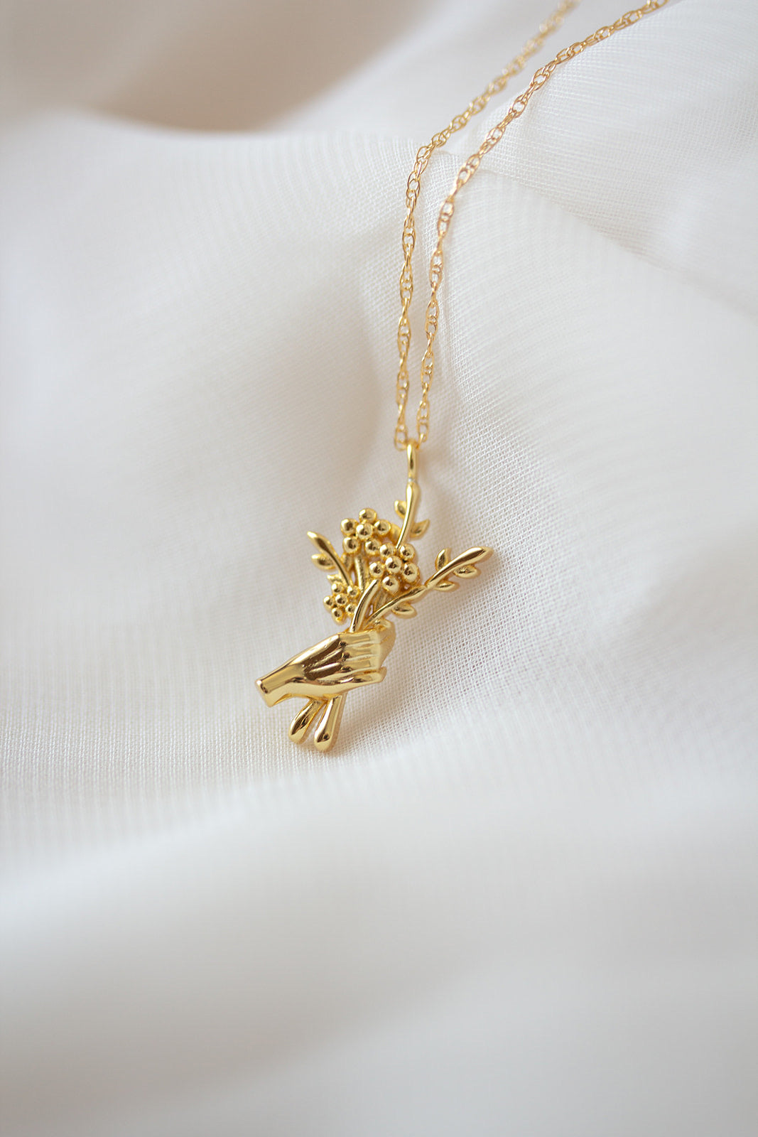 Hand Holding Flowers Necklace- pendant only